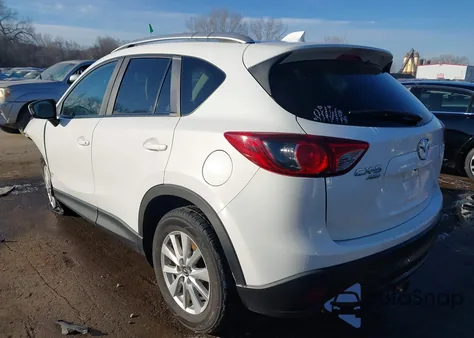 2014 Mazda Cx-5 Touring z USA, uszkodzony, nr VIN JM3KE4CY0E0354411